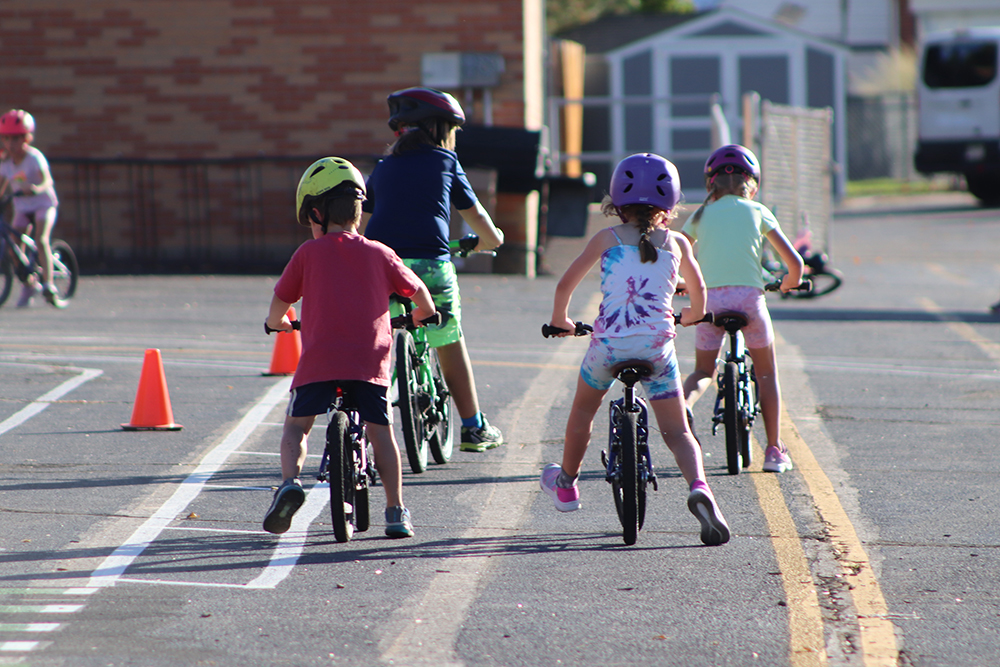 Children riding bikes at the practice park