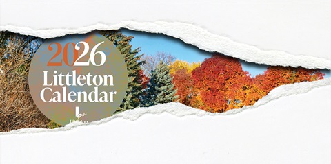 Torn paper reveals colorful 2026 Littleton Calendar cover with autumn trees and evergreen trees.